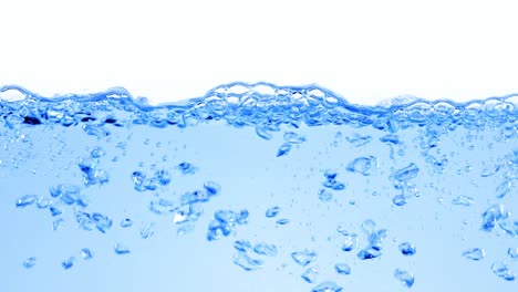 Viele-Blasen-Im-Wasser-Aus-Nächster-Nähe,-Abstrakte-Wasserwelle-Mit-Blasen-In-Zeitlupe