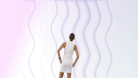 rear view of woman looking at pulsating white waves