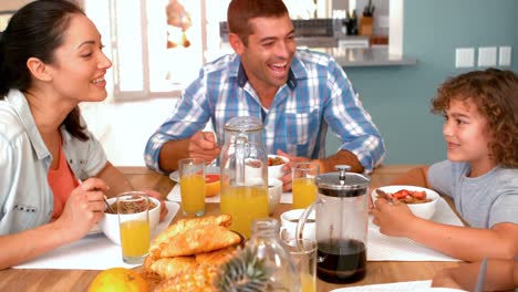 family having breakfast together