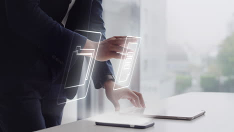 businessperson interacting with digital documents on tablet and laptop