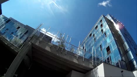 sun reflections on a modern glass building