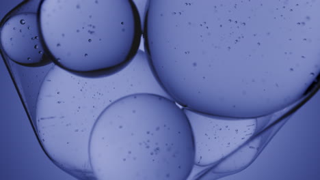 molecules slowly move in an abstract blue background