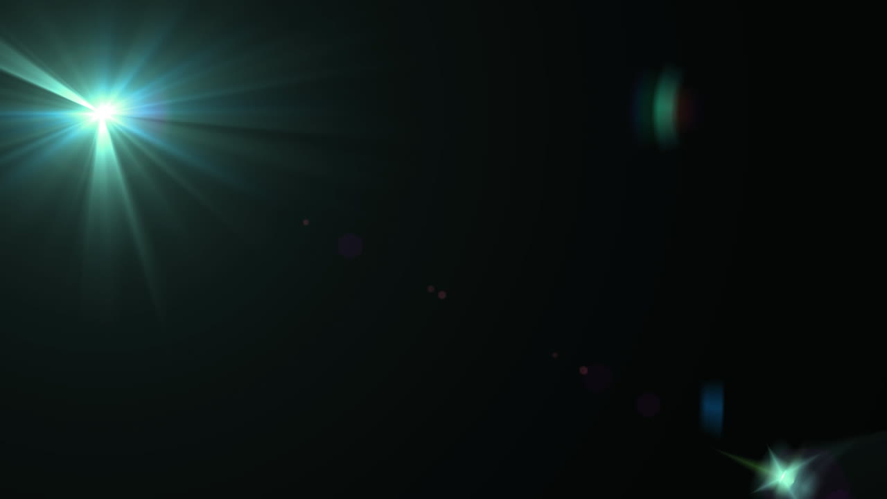 Animation af flere ord, der danner en menneskehjerne over linseflare på sort baggrund