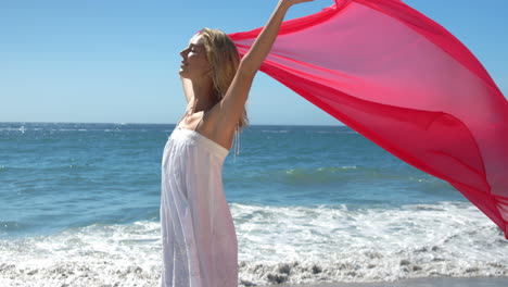 Woman-holding-towel-overhead