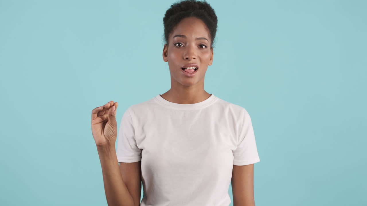 Young woman doing speaking too much gesture