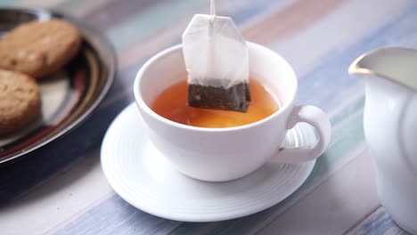 afternoon tea with cookies and tea bag