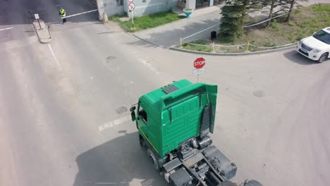 truck at security gate intersection with security guard