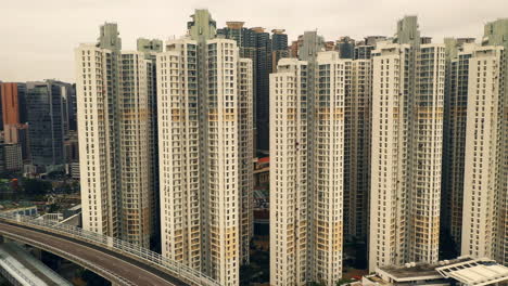 hong kong cityscape with high-rise buildings and overpasses