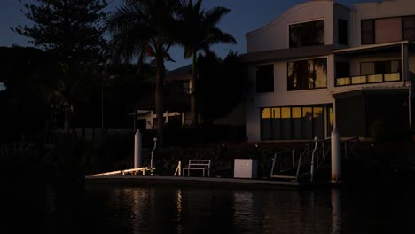 a serene canal scene at night in gold coast