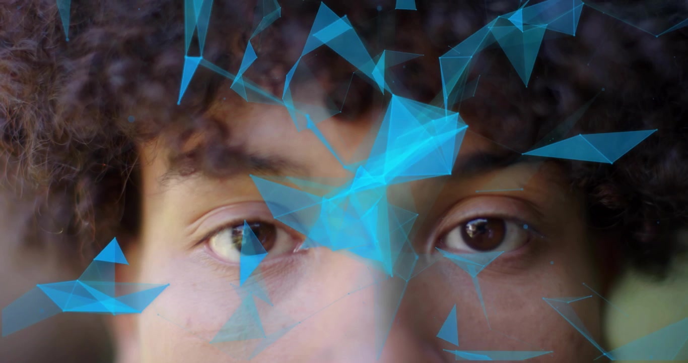 Man opening eyes following blue polygon network forming and fading on forehead for tech demo