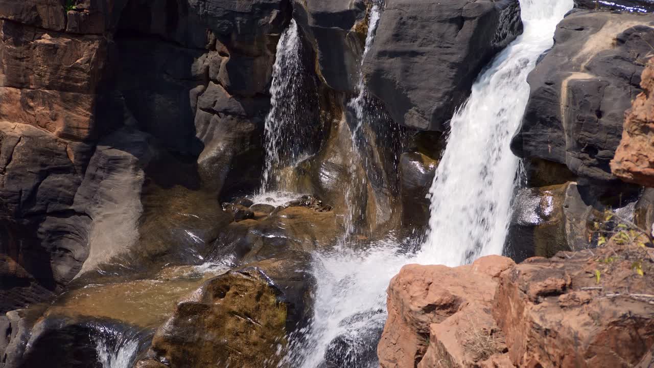 The Bourke's Luck Potholes where rivers flow over rocks, water and sediment can create beautiful natural sculptures