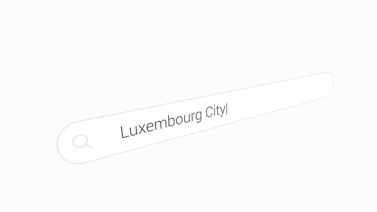 Close Up Of Typing Luxembourg City Into Search Bar On Computer.