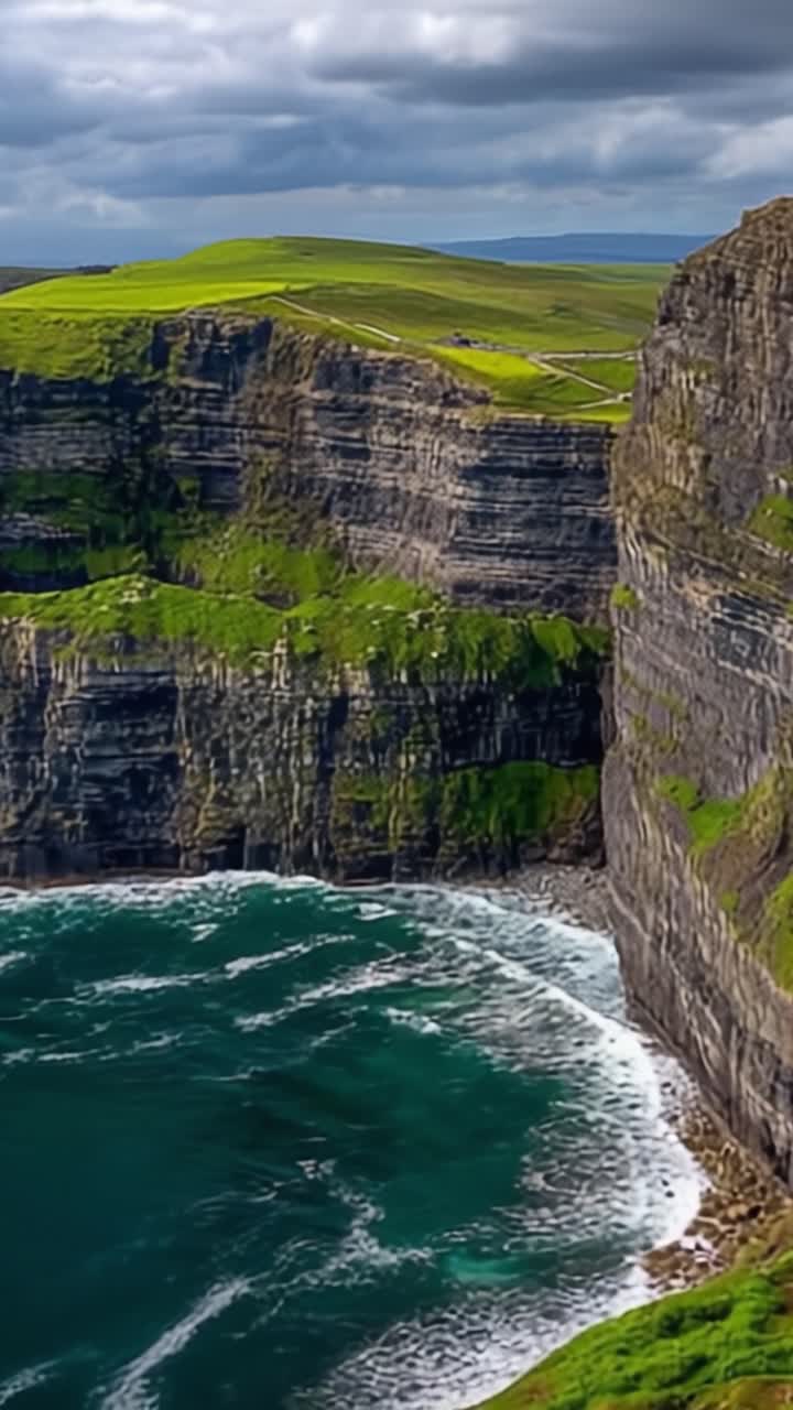 Magnificent Cliffs by the Ocean: A Breathtaking View of Lush Green Landscapes and Majestic Rock Formations Captured in Stunning Detail under Dramatic Skies