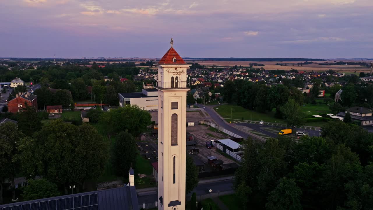 Evening drone footage of Eucharistic Saviour church with townscape Lithuania