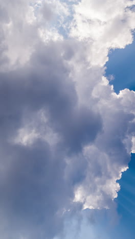 passing clouds in sky in vertical