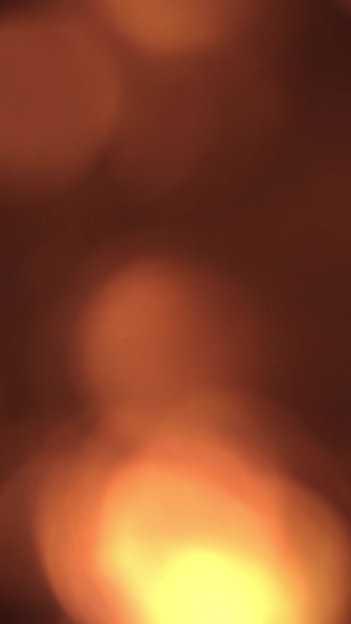 Perdite di Luce Calda Astratte e Sovrapposizione Bokeh