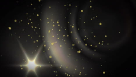 animation of glowing spots of light moving over black background
