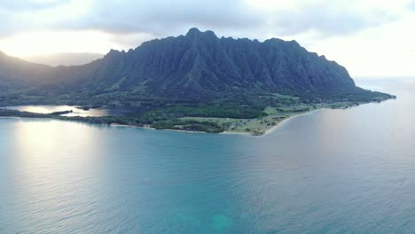 closing shot of a large mountain on the coast of hawaii