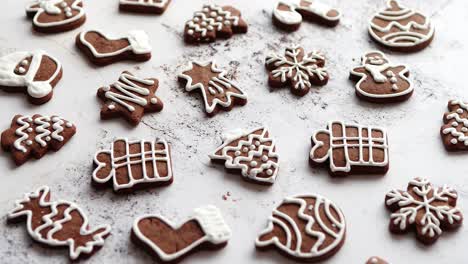 composition of delicious gingerbread cookies shaped in various christmas symbols