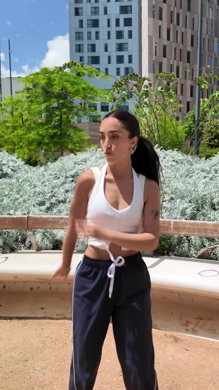 Woman dancing in a park