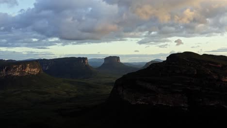 trucking left flying drone landscape shot of the stunning capao valley from the mount of pai inácio in the chapada diamantina national park in northern brazil on a warm sunny golden hour evening