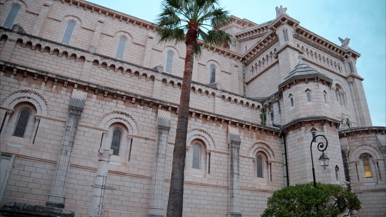 Monaco City, Monaco - September 4, 2024: The facade of the Monaco Cathedral in the Old Town in the evening