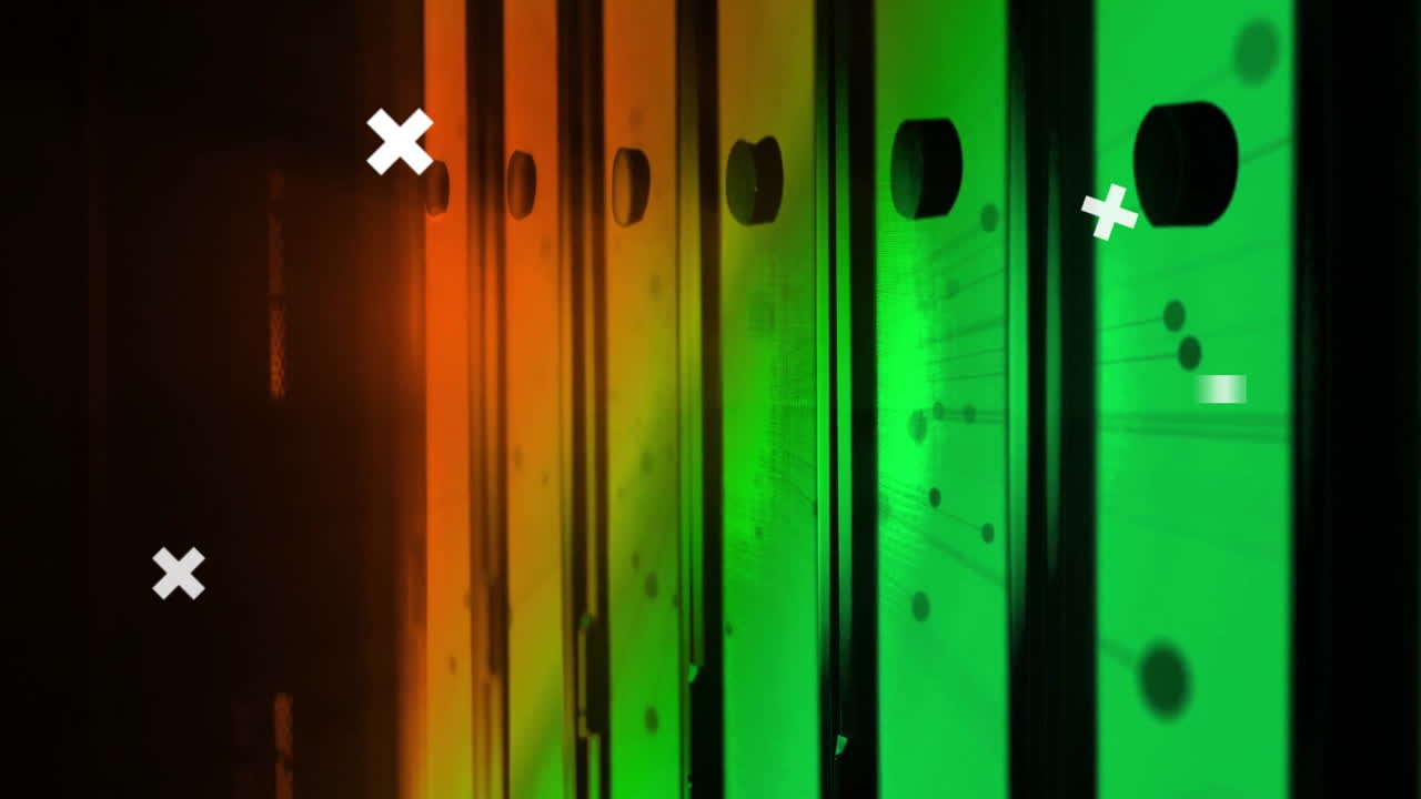 Illuminated colorful vertical panels with circular cutouts in orange and green hues