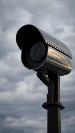 outdoor security camera under cloudy sky
