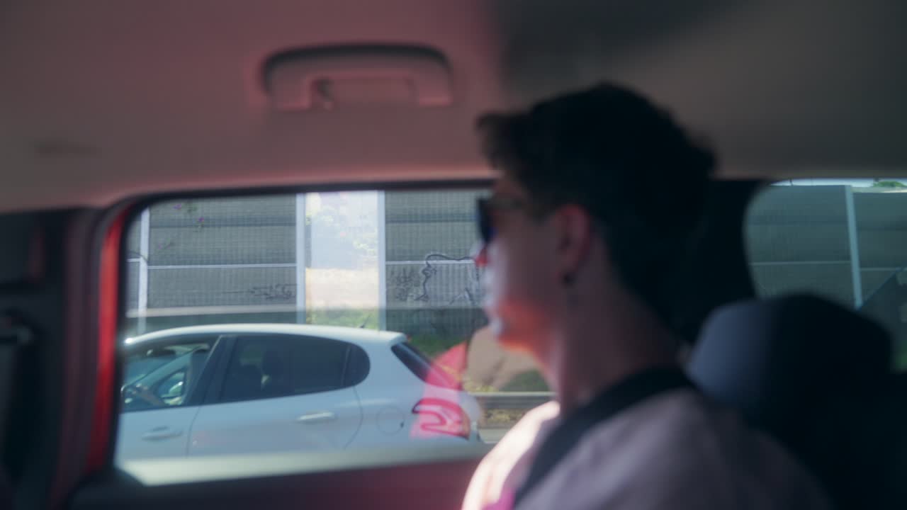 Passenger's View from Inside a Car on a Highway