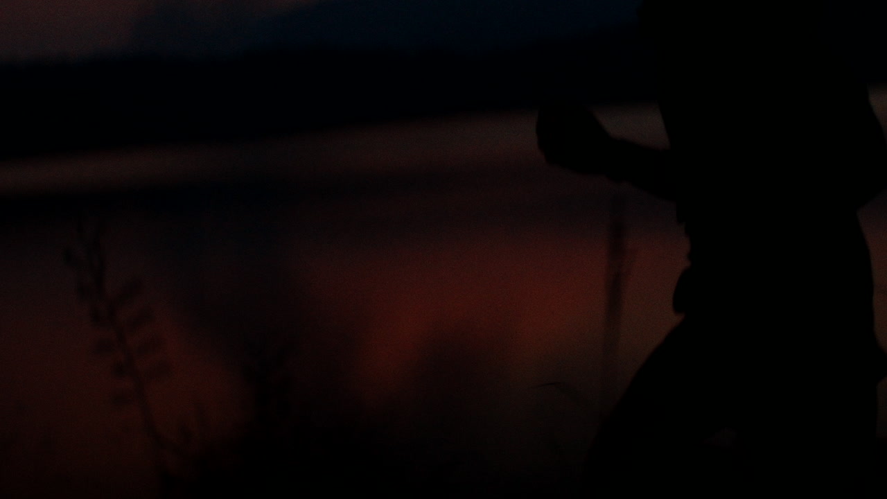Silhouette of a child at sunset