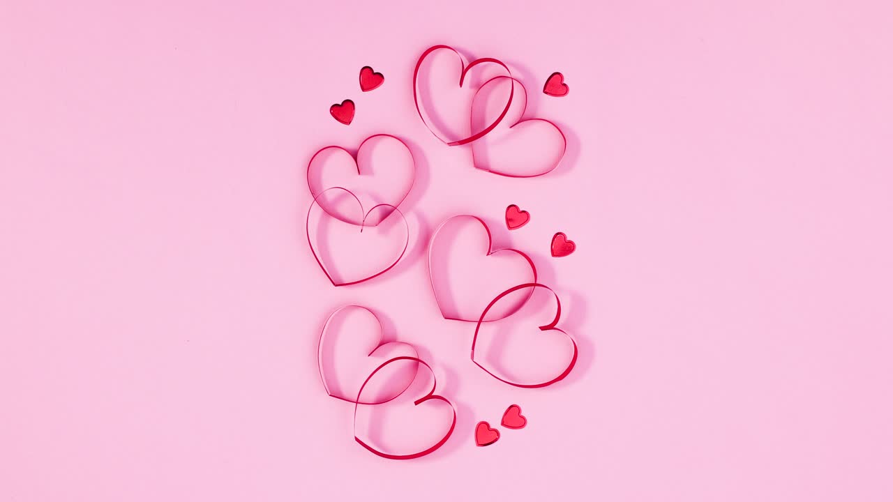 рамка для текста появляются рядом с романтическими сердцами украшение для дня святого валентина. остановить движение