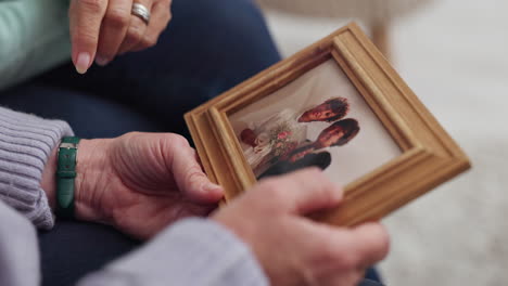 memory, frame picture and senior hands talking