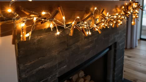 cozy fireplace mantel decorated with holiday lights