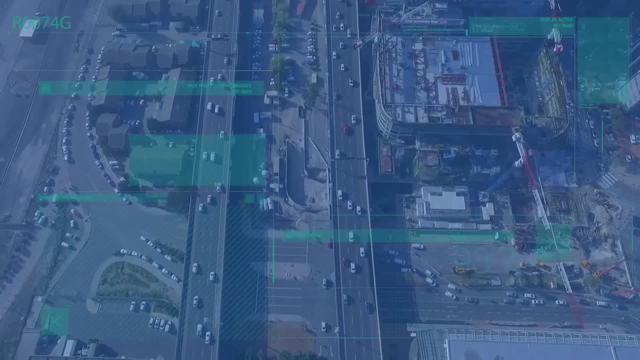 Animation of statistical data processing against aerial view of city highway