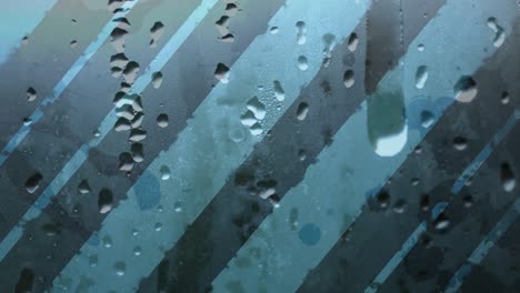 animation of drops on glass over stripes blue background