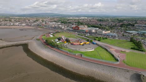 grassy seaside town headland and eden project proposed site. summer. marine road central, morecambe, lancashire, uk