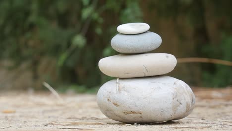 close-up stacking rocks outdoors with copy space