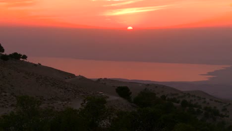 a beautiful sunset behind the dead sea in jordan 1