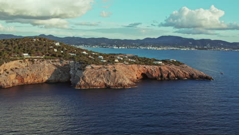 aerial revealed coastal town of sant antoni de portmany on ibiza western coast in spain