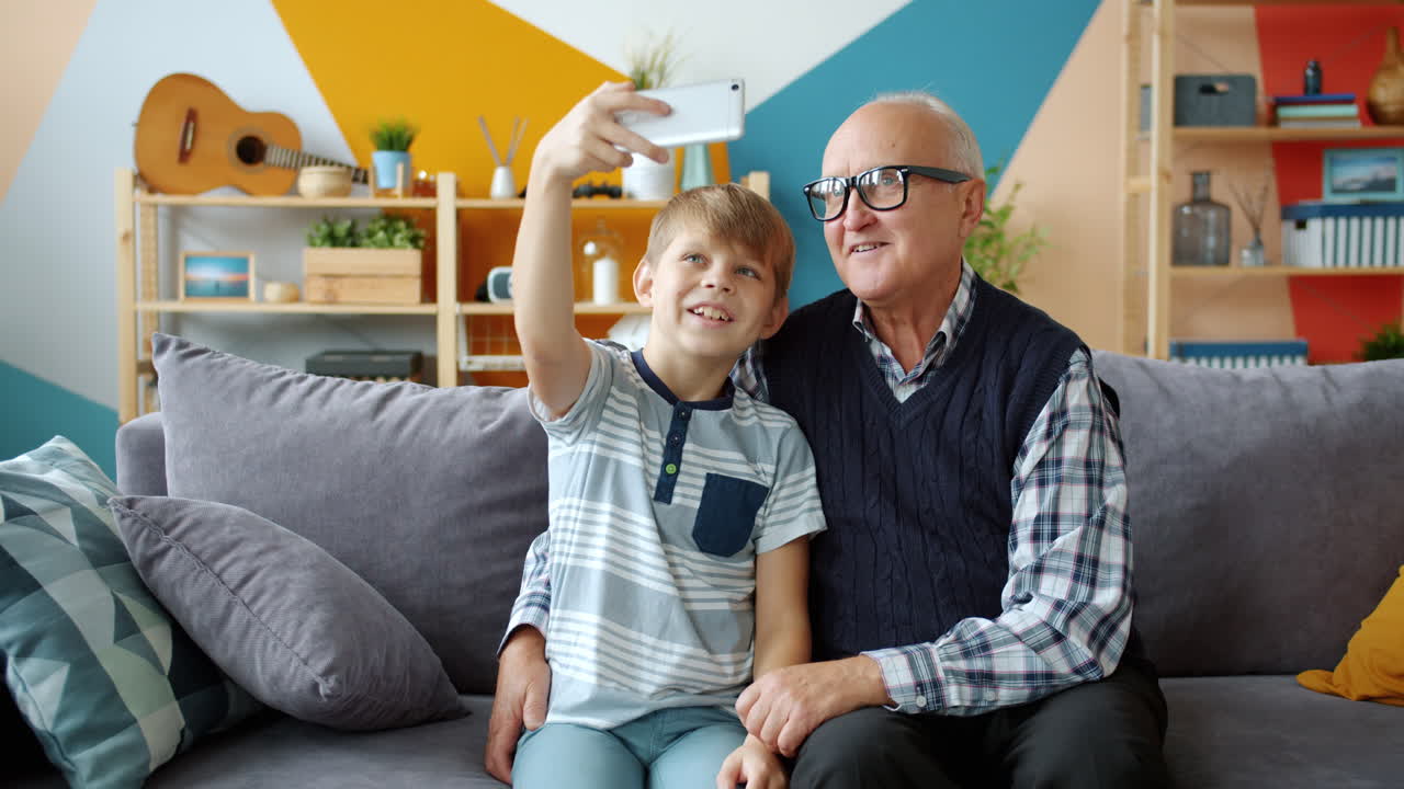 Grandfather and Grandson Taking a Selfie