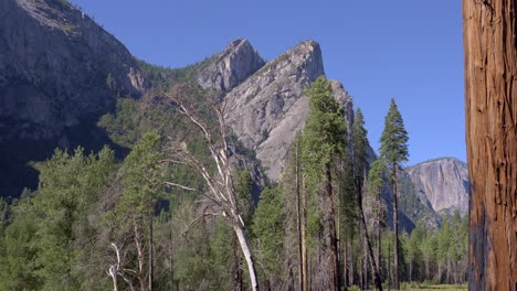 footage of the three brothers rock formation in yosemite national park, california. the peaks ae named: lower brother, middle brother, and eagle peak.
