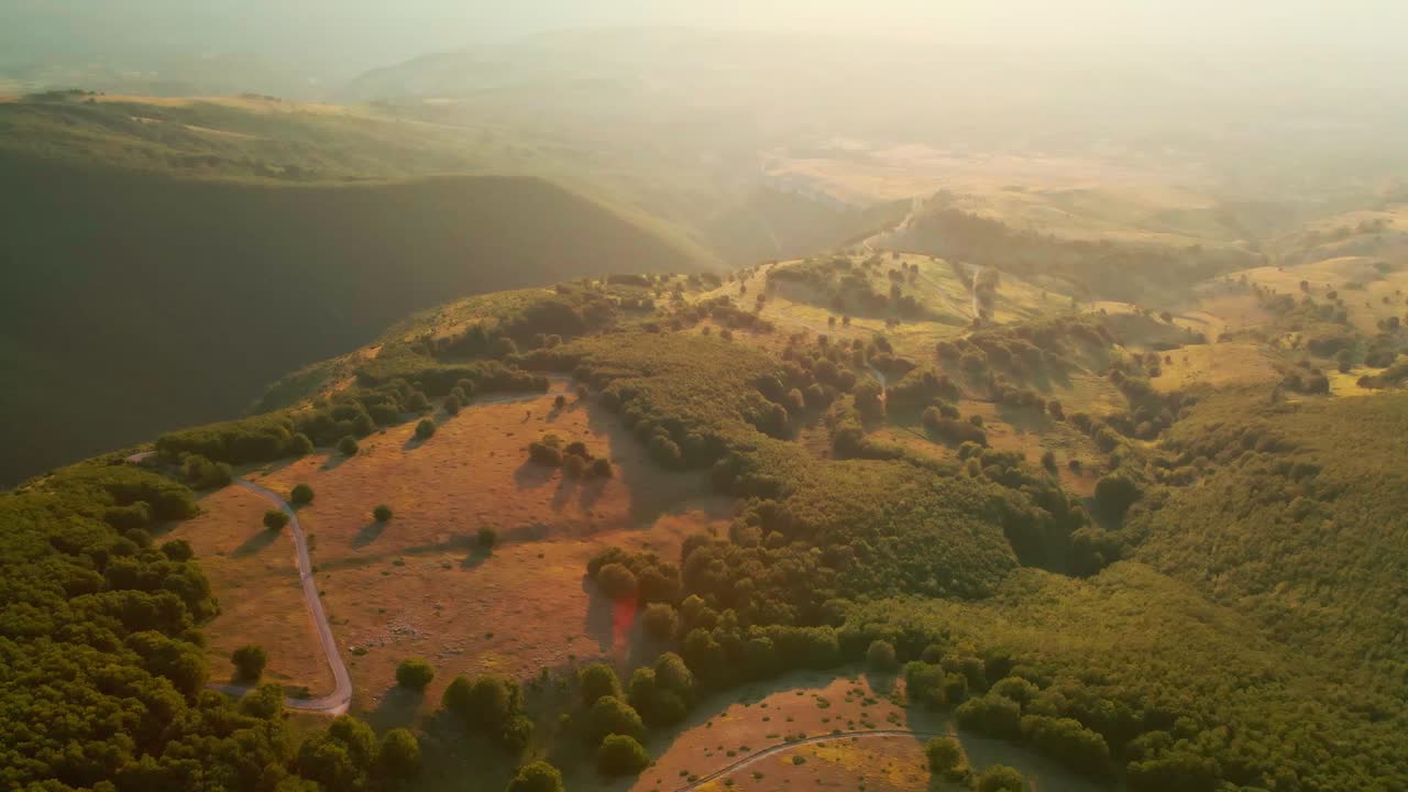 Aerial View Over Lush Green Vegetation At Majella National Park During Sunrise In Abruzzo, Italy - drone shot