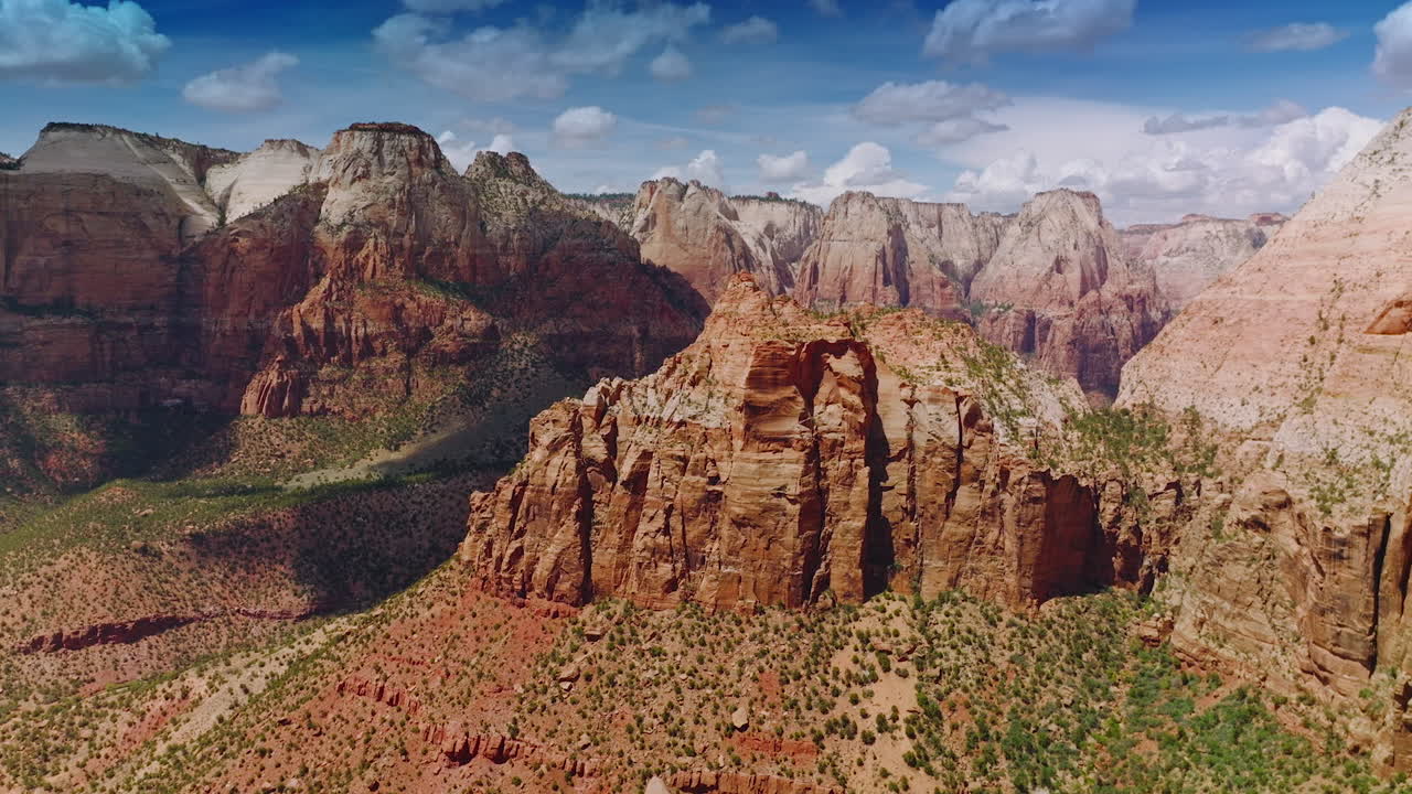 Impressive view of stunning rocks in Zion National Park in Utah, USA. Amazing canyons At the backdrop of bright cloudy sky.