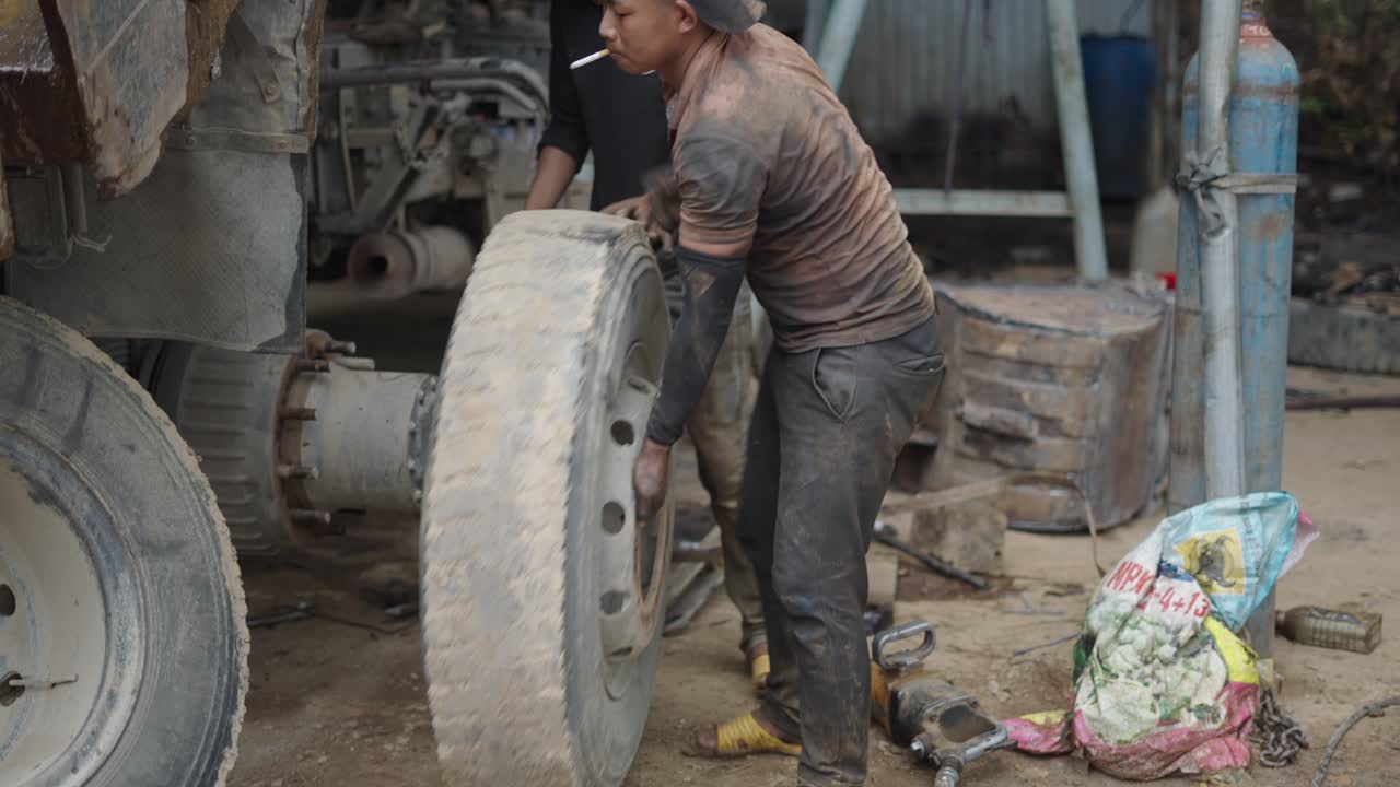 Truck Tire Change in a Workshop