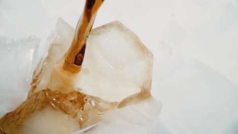 pouring soda over ice