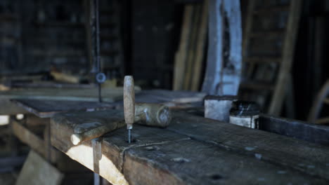 a close-up shot of a woodworking workbench with various tools