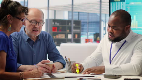 senior people consulting with their financial banker about retirement plans