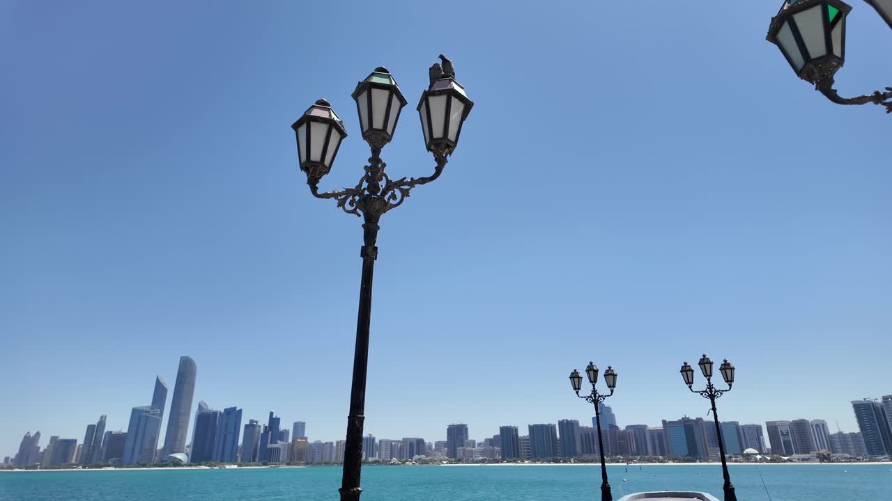 A view of the Abu Dhabi skyline on a bright, sunny day in the United Arab Emirates