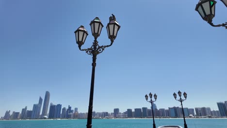 A view of the Abu Dhabi skyline on a bright, sunny day in the United Arab Emirates
