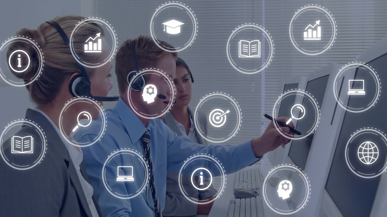 Trainer pointing pen and speaking at monitor, causing animated tech icons showing data for training